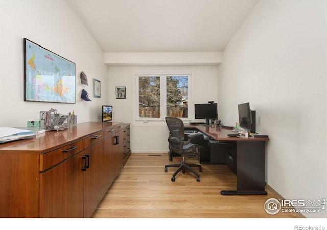 office area with light hardwood / wood-style flooring