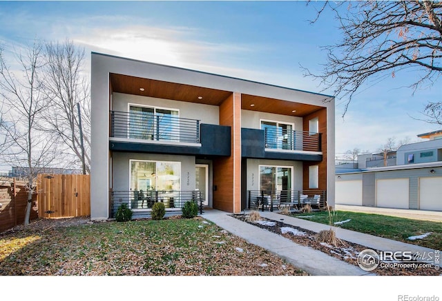 view of front of property with a balcony