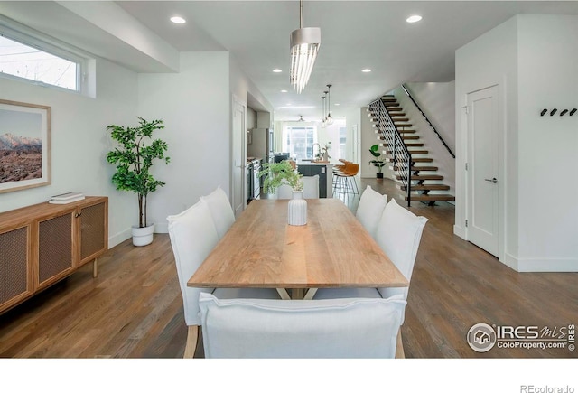 dining room with plenty of natural light, dark wood-type flooring, and sink