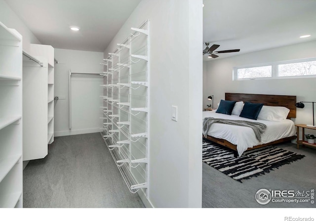 carpeted bedroom featuring ceiling fan