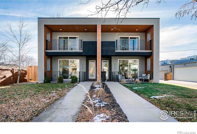 contemporary home with a balcony