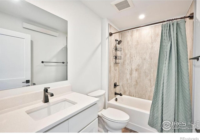 full bathroom with vanity, shower / bathtub combination with curtain, and toilet