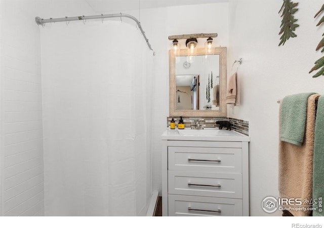 bathroom featuring vanity and walk in shower