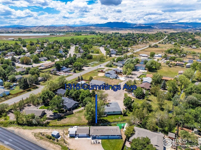 drone / aerial view featuring a mountain view