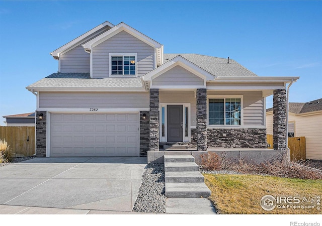 view of front of property featuring a garage