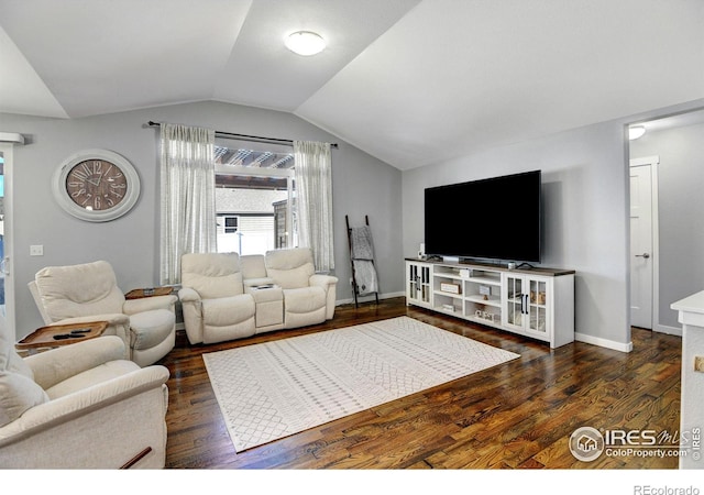 living room with vaulted ceiling and dark hardwood / wood-style flooring