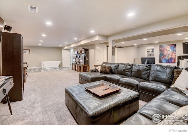 living room featuring light carpet