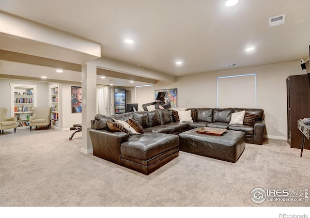 living room featuring light colored carpet