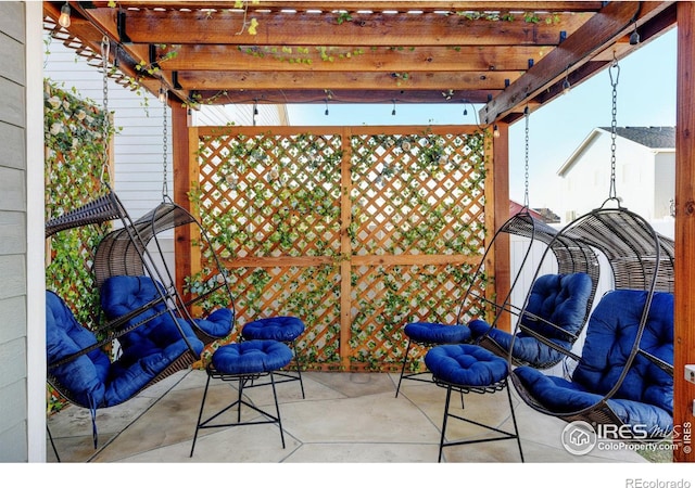 view of patio featuring a pergola