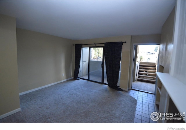 empty room featuring tile patterned flooring