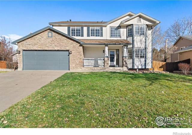 front facade with a porch, a garage, and a front lawn