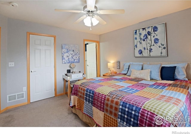 bedroom featuring ceiling fan and light colored carpet