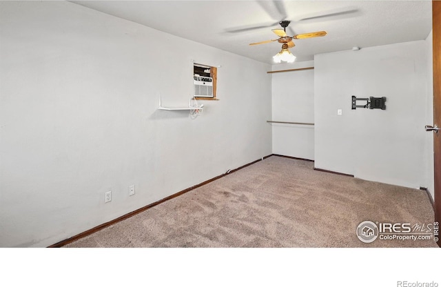 spare room with carpet flooring and ceiling fan