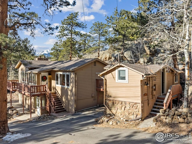 view of front of property with a deck