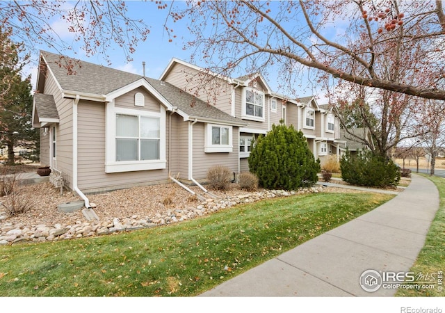 view of front of house with a front yard