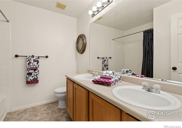 full bathroom featuring vanity, toilet, and shower / bath combo with shower curtain