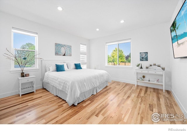 bedroom featuring hardwood / wood-style floors