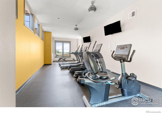 gym with ceiling fan