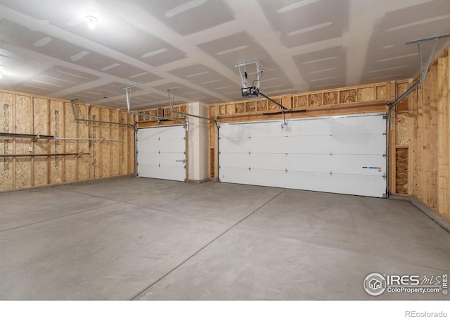 garage featuring a garage door opener