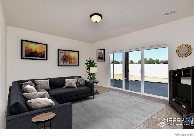 living room with light colored carpet