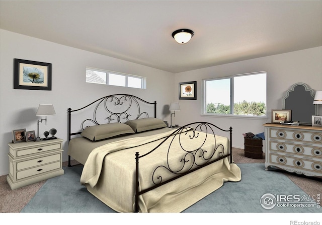 bedroom featuring light colored carpet