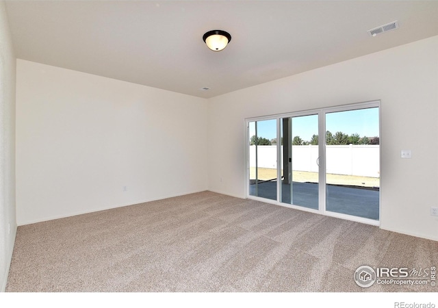 view of carpeted spare room
