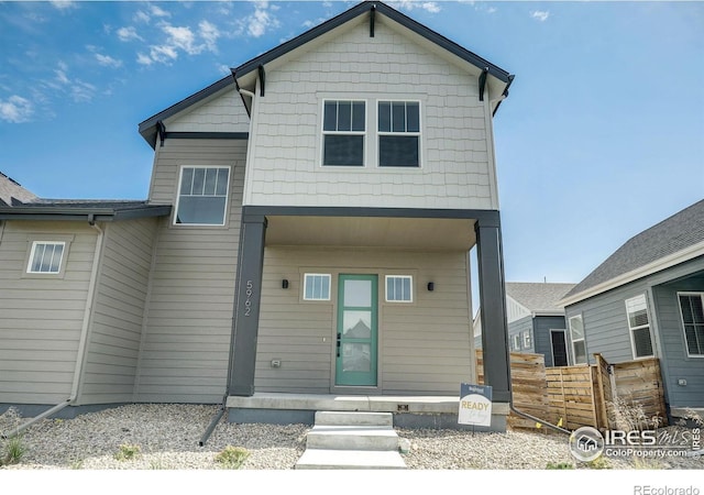 view of front of property featuring covered porch