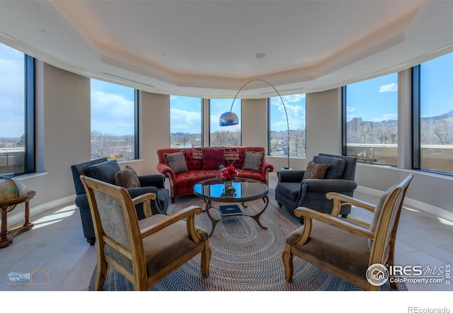 1077 Canyon Blvd # 403, Boulder, CO 80302 - living room with a raised ceiling and tile patterned flooring