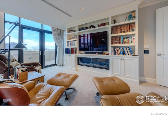 1077 Canyon Blvd # 403, Boulder, CO 80302 - living room featuring light carpet, built in shelves, and baseboards