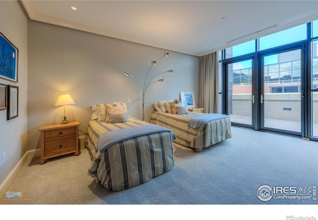 1077 Canyon Blvd # 403, Boulder, CO 80302 - bedroom with carpet floors, multiple windows, access to outside, baseboards, and expansive windows