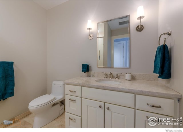 1077 Canyon Blvd # 403, Boulder, CO 80302 - half bathroom with vanity, toilet, and tile patterned flooring