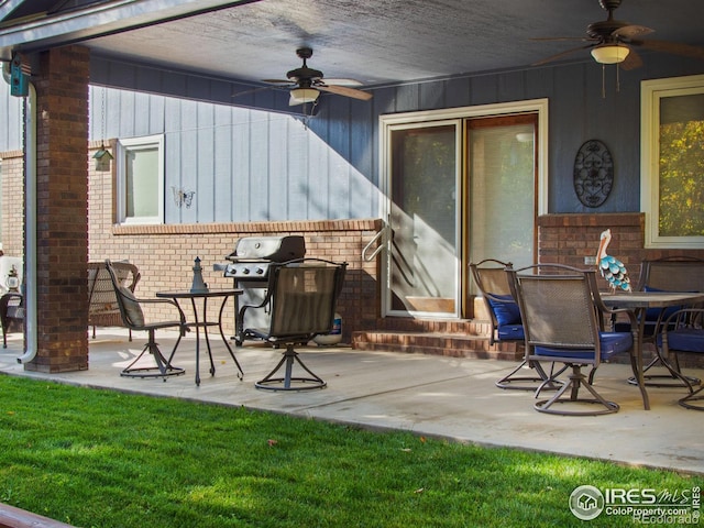 view of patio / terrace featuring ceiling fan and a grill