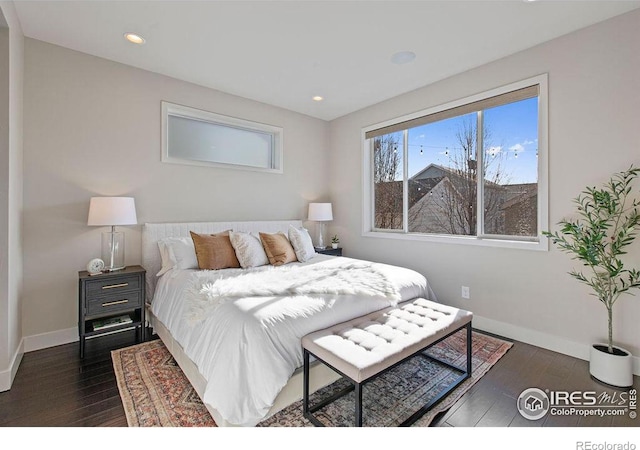 bedroom featuring dark hardwood / wood-style floors