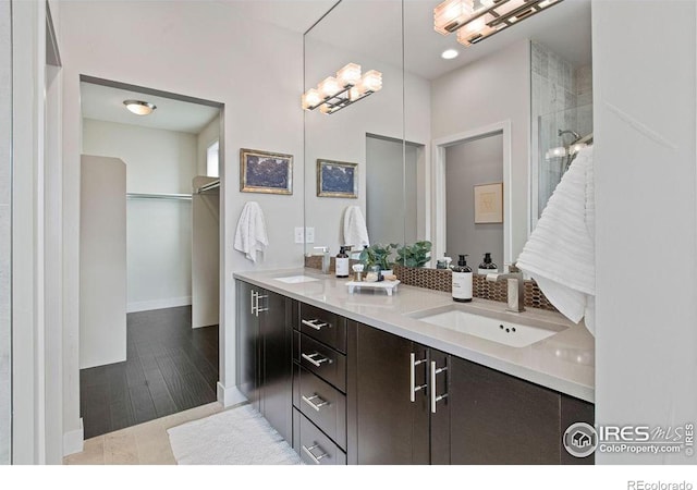 bathroom featuring tile patterned floors and vanity