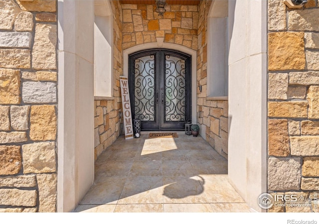 view of exterior entry with french doors