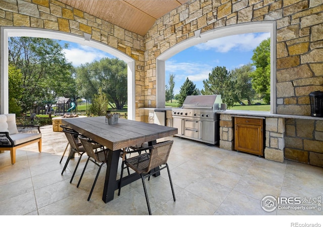 view of patio with a grill and exterior kitchen