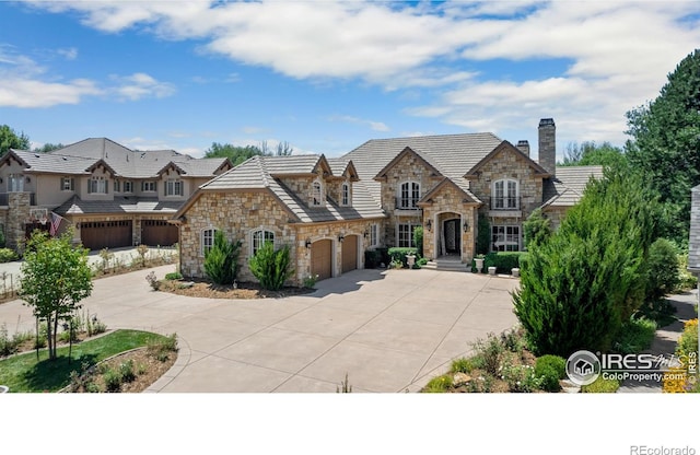 tudor home featuring a garage