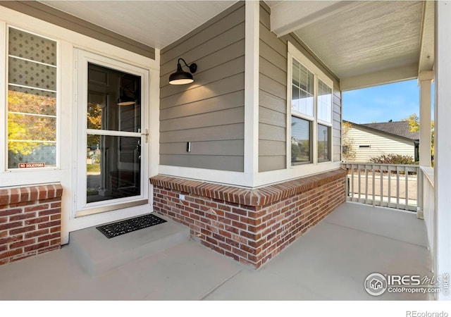 entrance to property with a porch