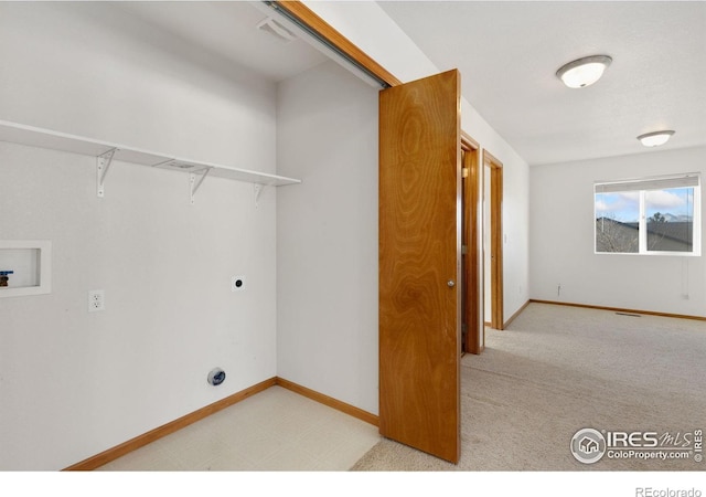 laundry room featuring light carpet, washer hookup, and hookup for an electric dryer