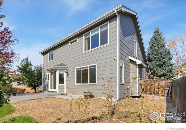 rear view of house featuring a patio area