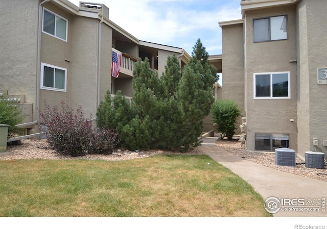 view of property with central AC unit