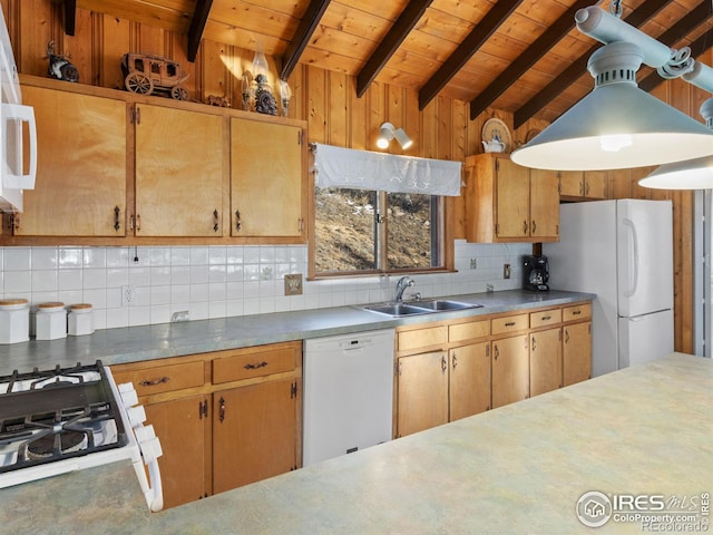 kitchen with white appliances, lofted ceiling with beams, sink, decorative backsplash, and wood ceiling