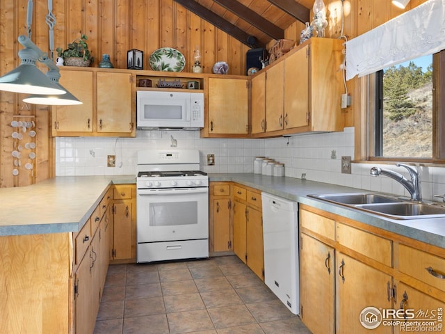 kitchen with white appliances, dark tile patterned flooring, sink, decorative backsplash, and wood ceiling