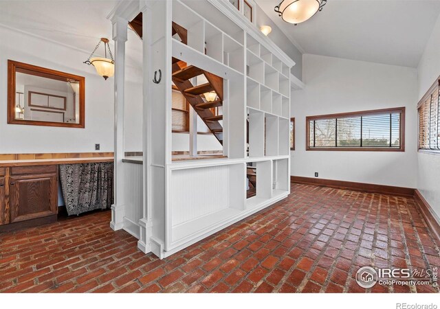 interior space featuring vaulted ceiling