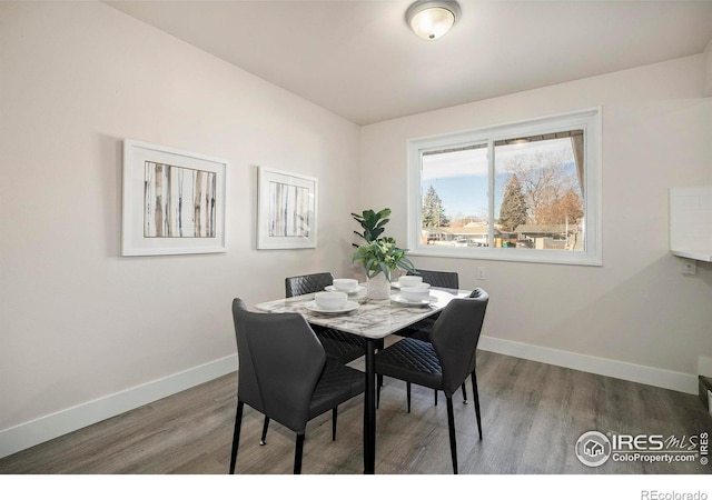 dining area featuring hardwood / wood-style flooring