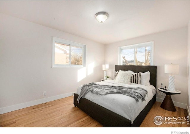 bedroom featuring light hardwood / wood-style floors