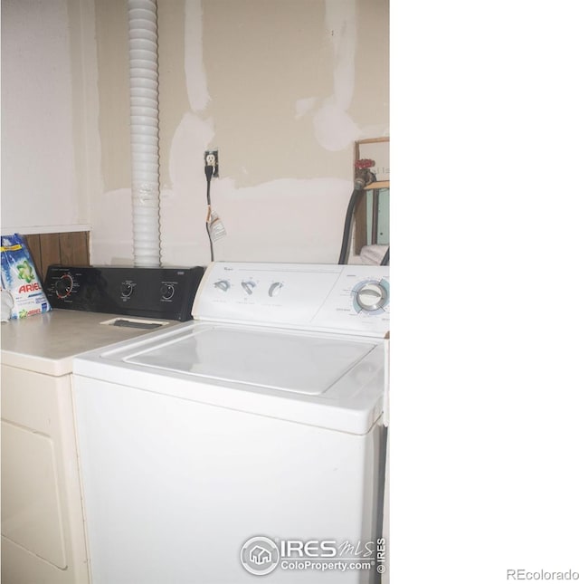 laundry area with separate washer and dryer