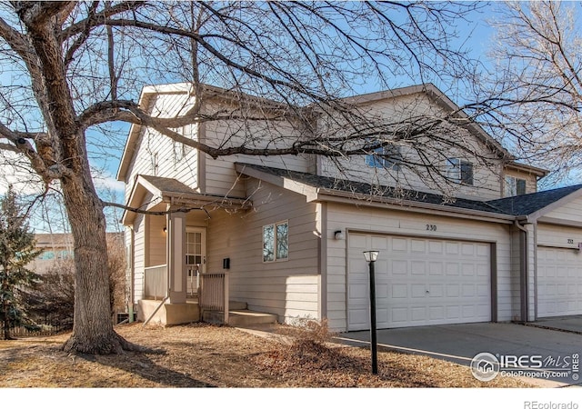 view of front of property featuring a garage