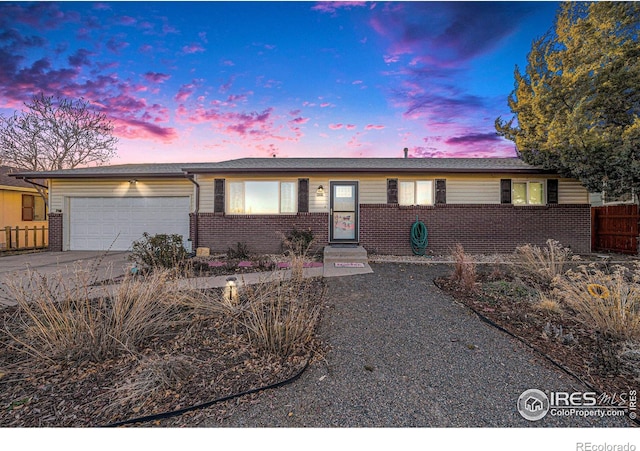 single story home with a garage