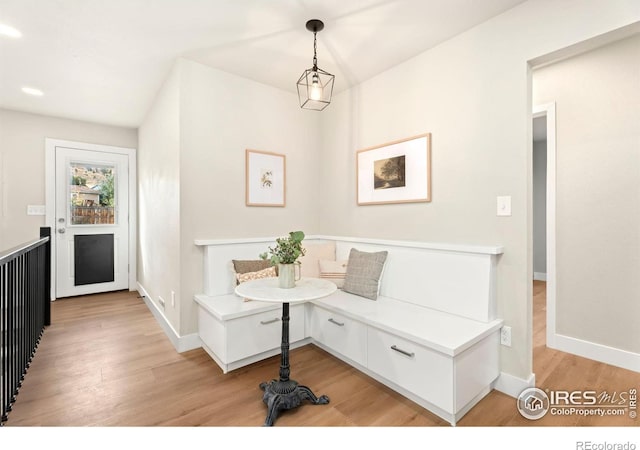 hall with light hardwood / wood-style floors